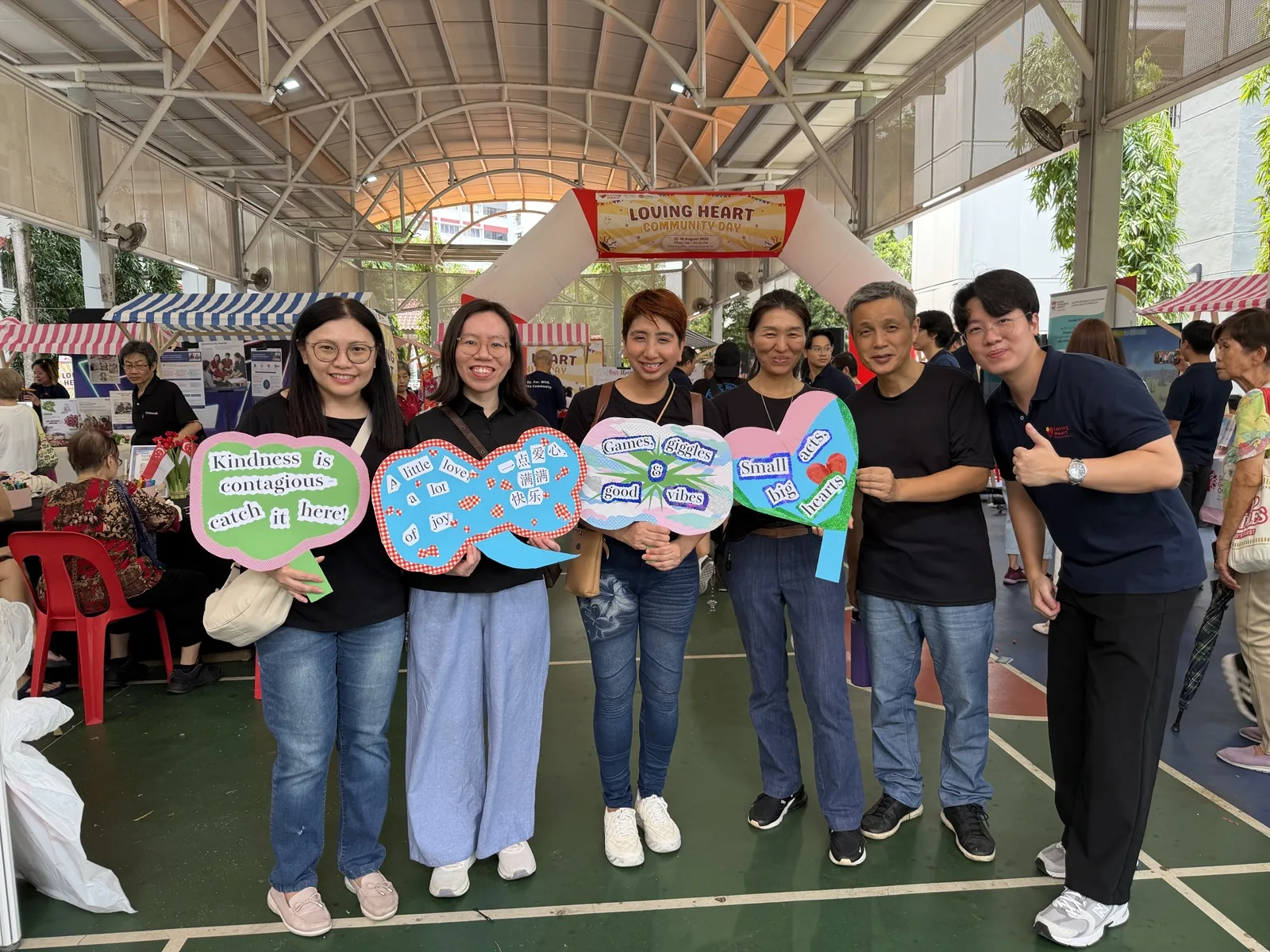 SKS team under the Loving Heart Community Day arch