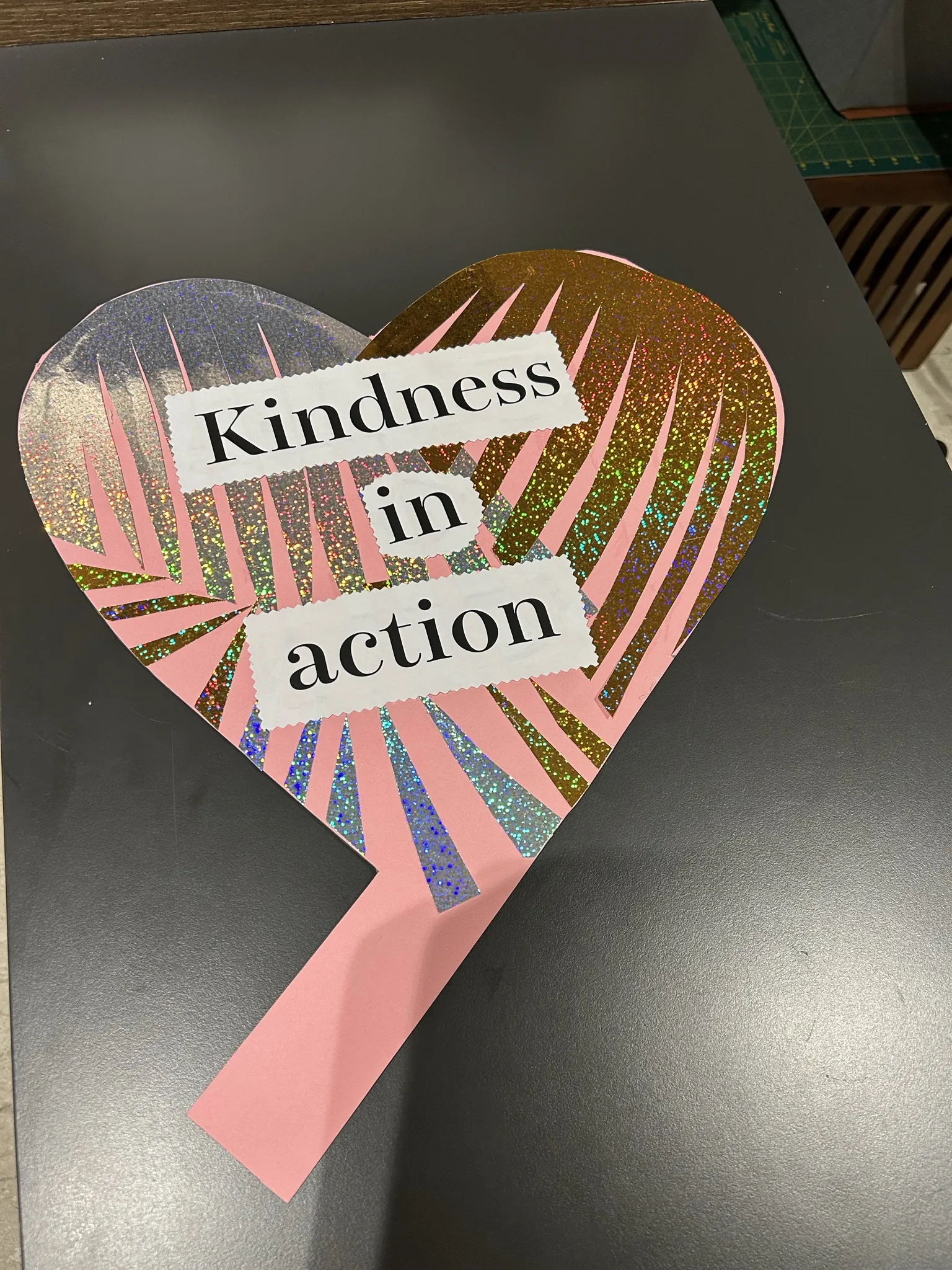 "Kindness in action" holographic heart prop