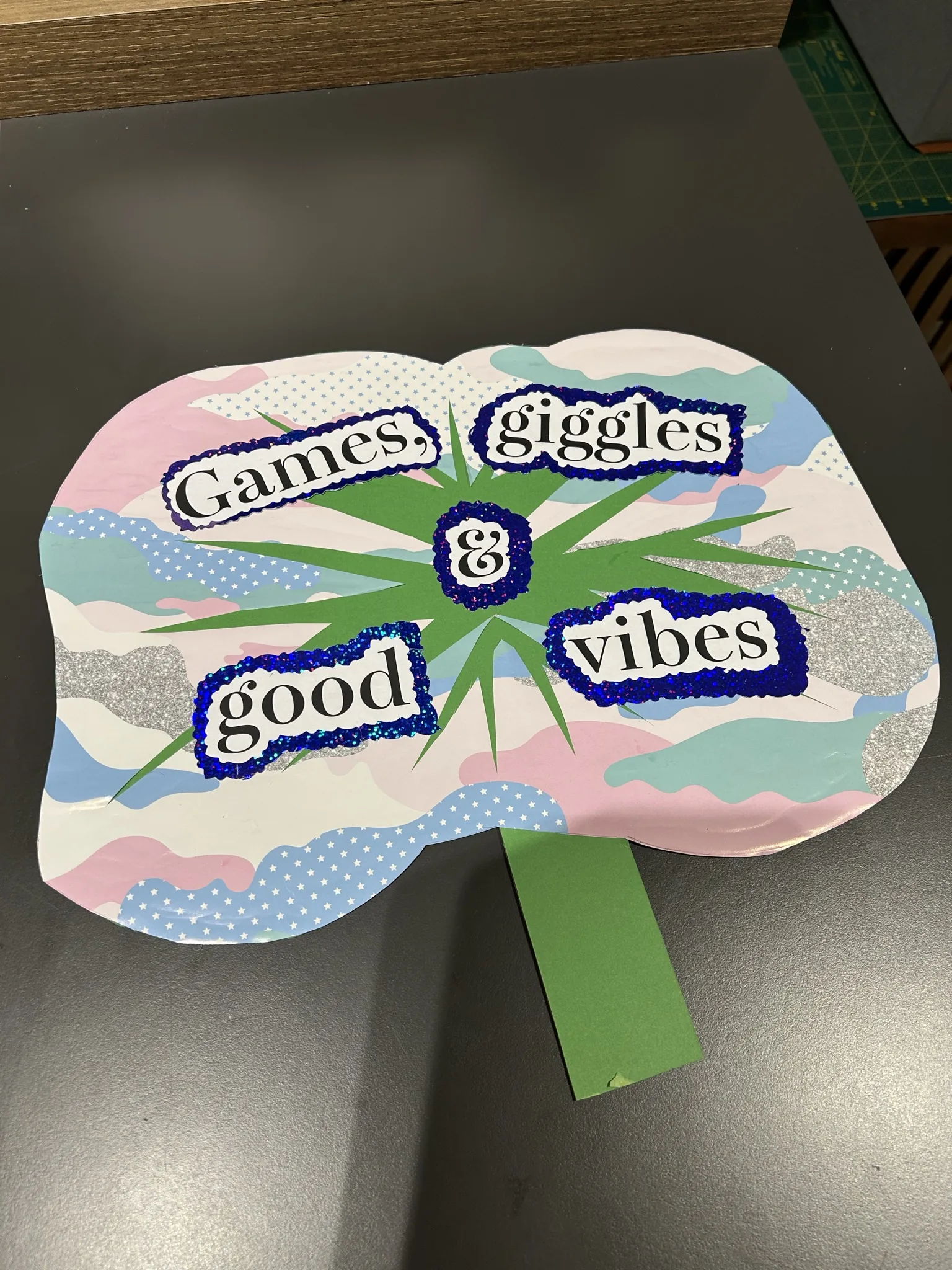 "Games, giggles & good vibes" prop